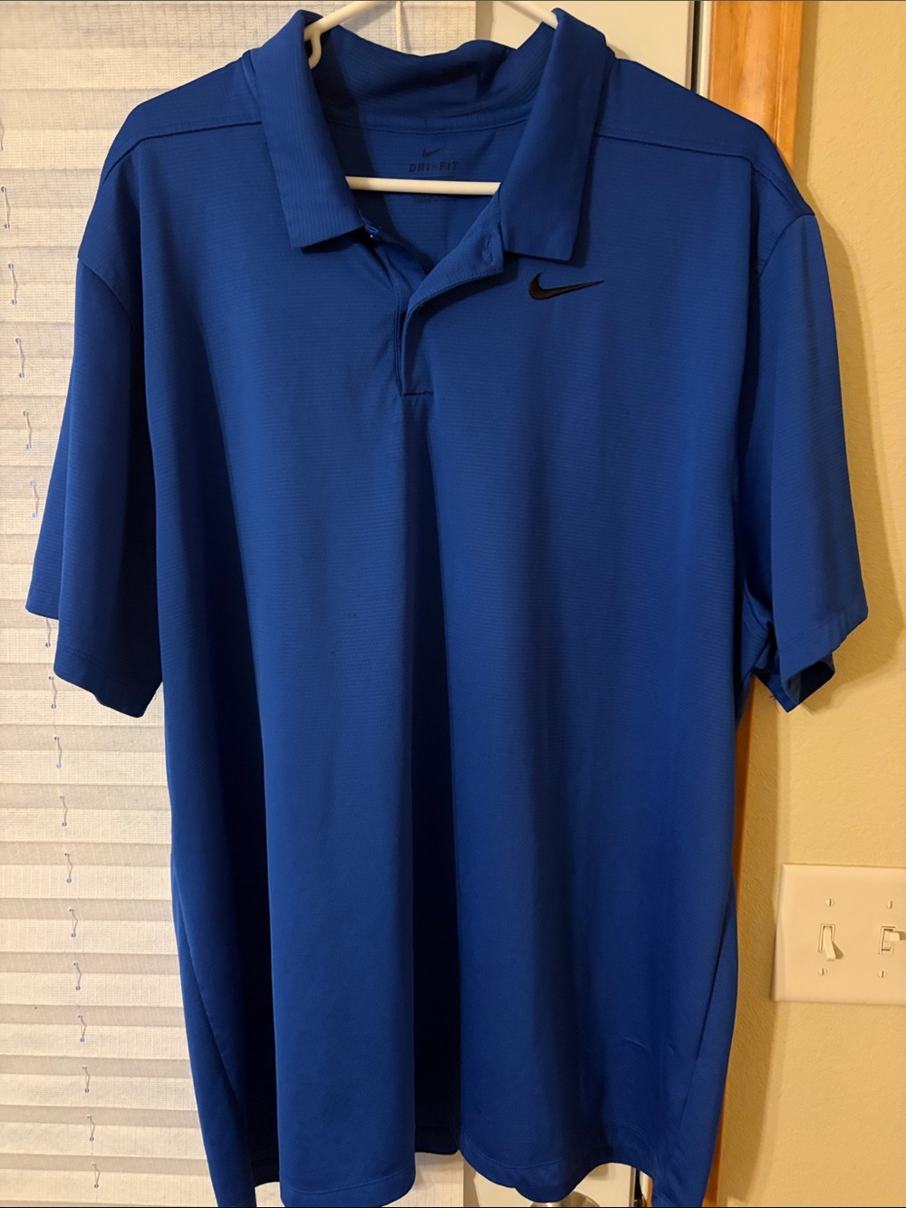 Nike Men’s Royal Blue Polo with Black Swoosh